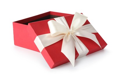 Photo of Open gift box with beautiful lid isolated on white