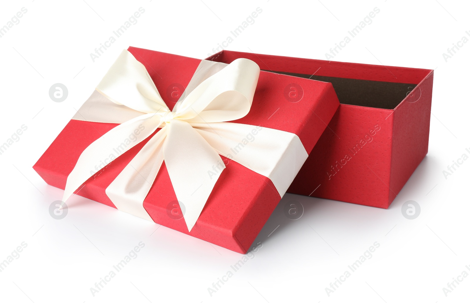 Photo of Open gift box with beautiful lid isolated on white