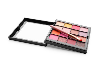 Photo of Beautiful eyeshadow palette with brush isolated on white