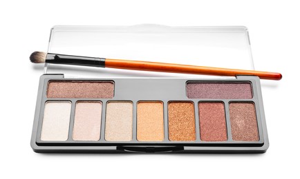 Photo of Beautiful eyeshadow palette with brush isolated on white