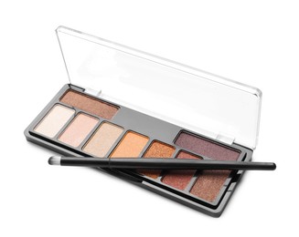Photo of Beautiful eyeshadow palette with brush isolated on white