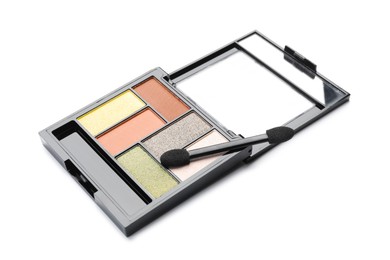 Photo of Beautiful eyeshadow palette with applicator isolated on white