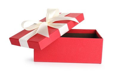Photo of Open gift box with beautiful lid isolated on white