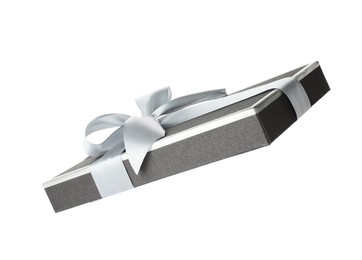 Photo of Beautiful gift box lid with bow isolated on white