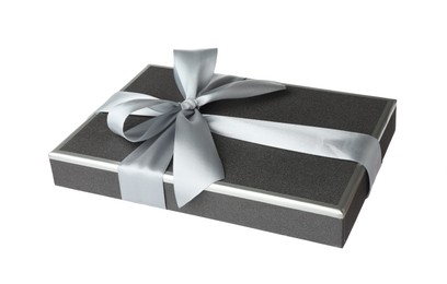 Photo of Beautiful gift box lid with bow isolated on white