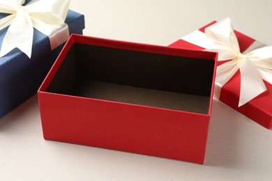 Photo of Beautiful color gift boxes on light background