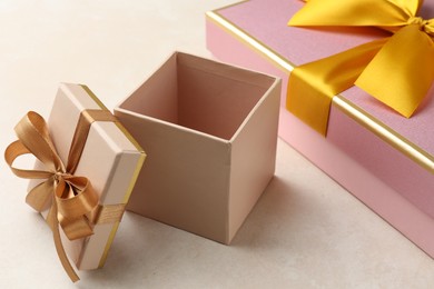 Photo of Beautiful color gift boxes on light background