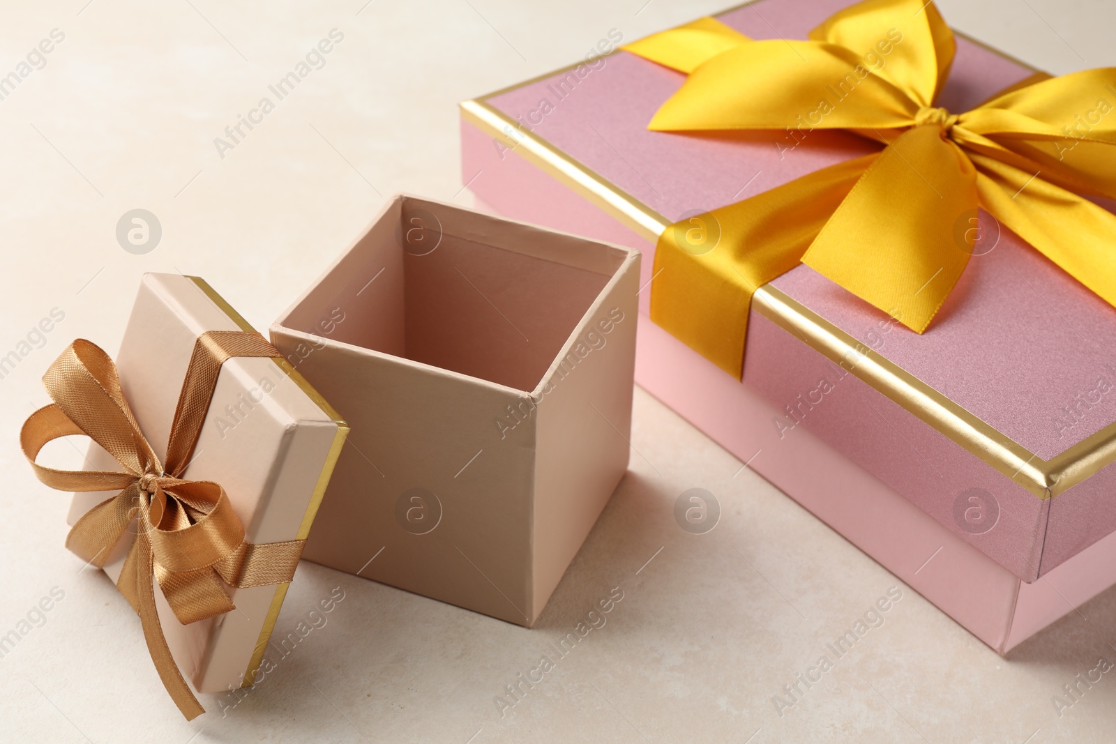 Photo of Beautiful color gift boxes on light background