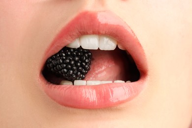 Photo of Woman with beautiful lips makeup and blackberry, closeup