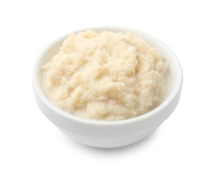Photo of Tasty horseradish sauce in bowl isolated on white