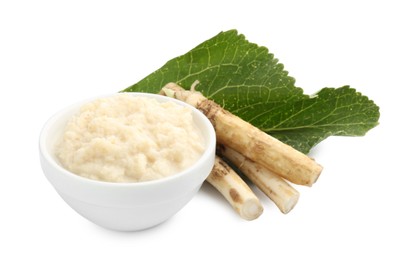 Photo of Tasty horseradish sauce in bowl, roots and leaf isolated on white