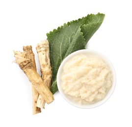 Photo of Tasty horseradish sauce in bowl, roots and leaf isolated on white, top view