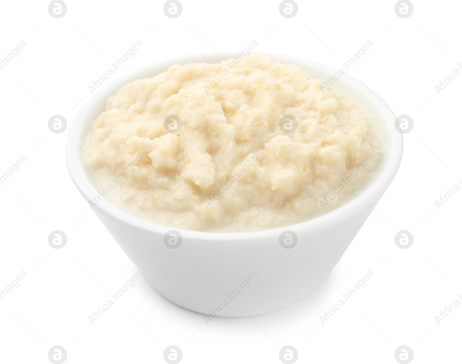 Photo of Tasty horseradish sauce in bowl isolated on white
