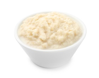 Photo of Tasty horseradish sauce in bowl isolated on white