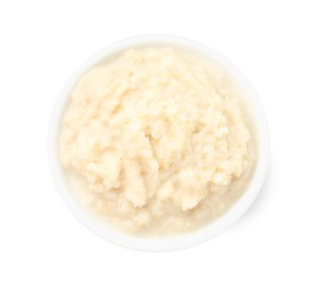 Photo of Tasty horseradish sauce in bowl isolated on white, top view