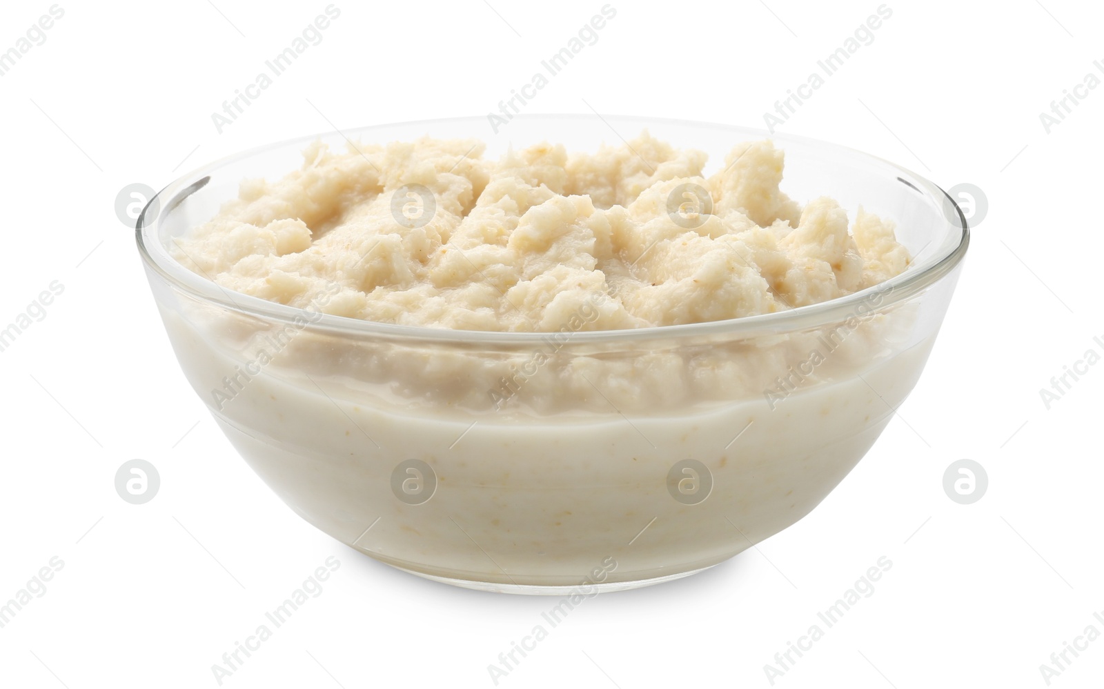 Photo of Tasty horseradish sauce in glass bowl isolated on white