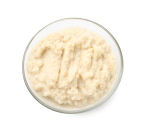 Photo of Tasty horseradish sauce in bowl isolated on white, top view