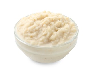 Photo of Tasty horseradish sauce in bowl isolated on white