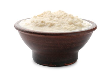 Photo of Tasty horseradish sauce in bowl isolated on white