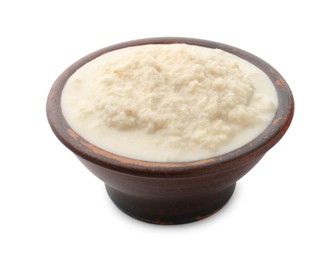 Photo of Tasty horseradish sauce in bowl isolated on white