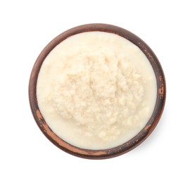 Photo of Tasty horseradish sauce in bowl isolated on white, top view