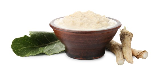 Photo of Tasty horseradish sauce in bowl, roots and leaf isolated on white