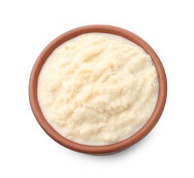 Photo of Tasty horseradish sauce in bowl isolated on white, top view