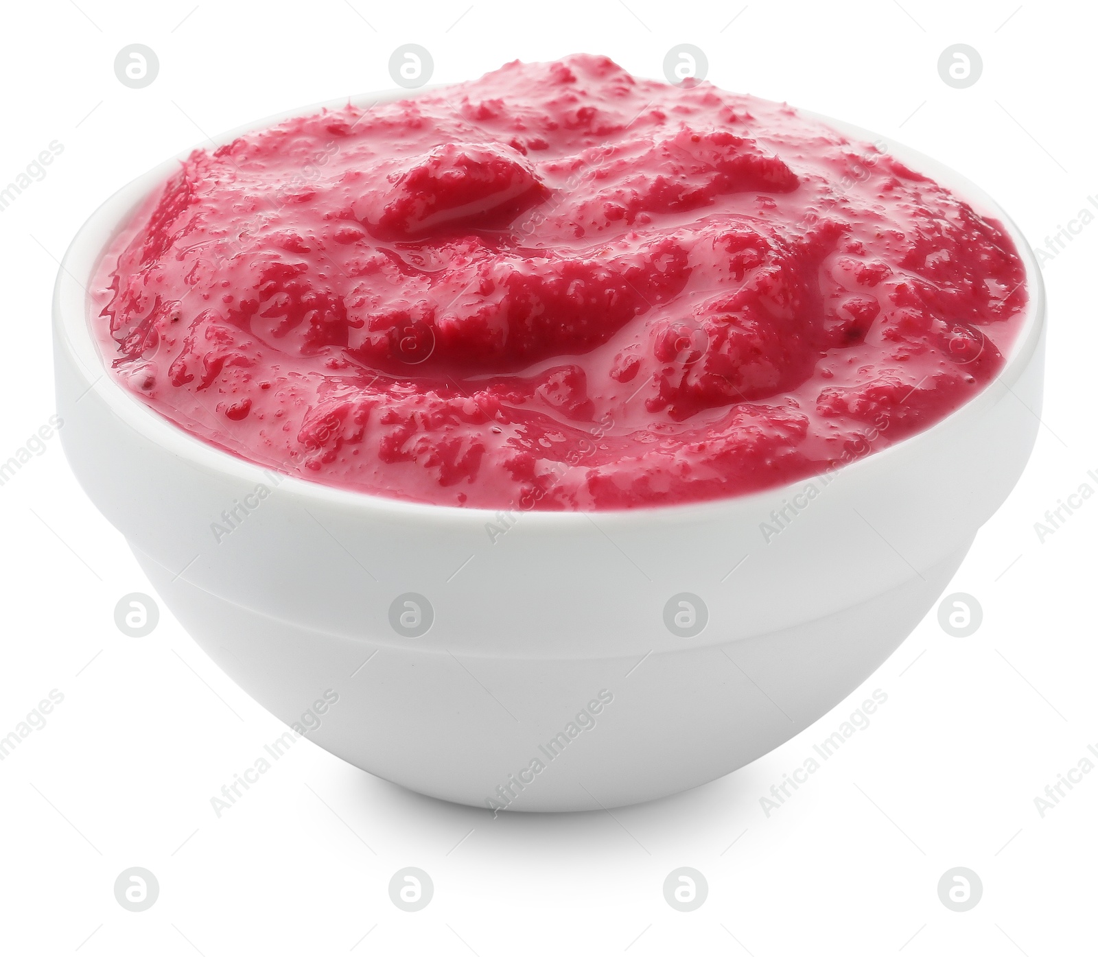 Photo of Tasty horseradish sauce with beetroot in bowl isolated on white