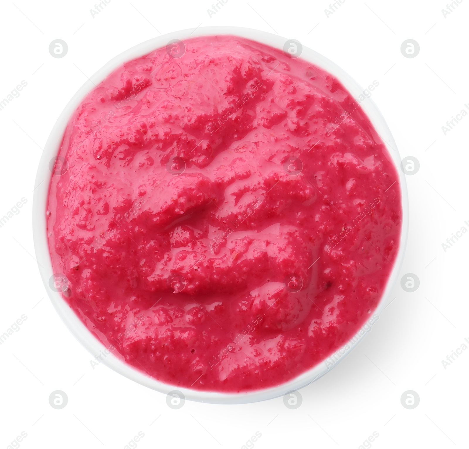 Photo of Tasty horseradish sauce with beetroot in bowl isolated on white, top view