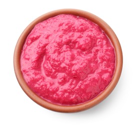 Photo of Tasty horseradish sauce with beetroot in bowl isolated on white, top view