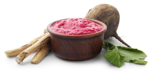 Photo of Tasty horseradish sauce in bowl, beetroot, leaves and roots isolated on white