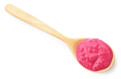 Photo of Tasty horseradish sauce with beetroot in spoon isolated on white, top view