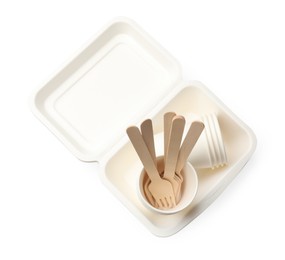 Photo of Set of disposable tableware isolated on white, top view