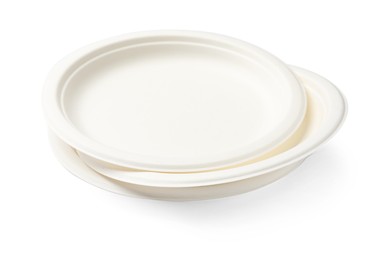 Photo of Set of disposable plates isolated on white