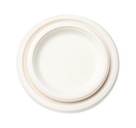 Photo of Set of disposable plates isolated on white, top view