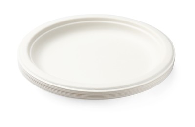 Photo of Set of disposable plates isolated on white