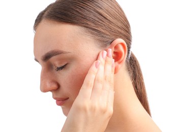 Photo of Sound. Woman touching his ear on white background, closeup