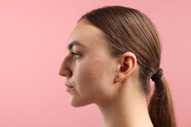 Photo of Sound. Woman on pink background, closeup view
