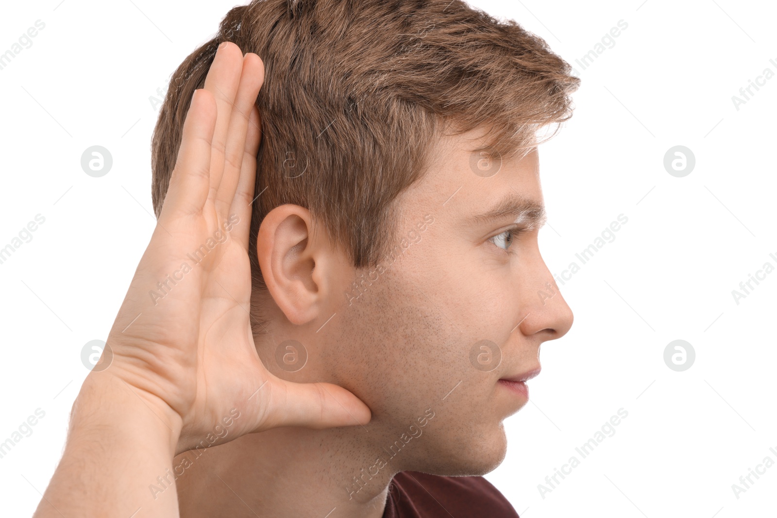 Photo of Sound. Man showing hand to ear gesture on white background