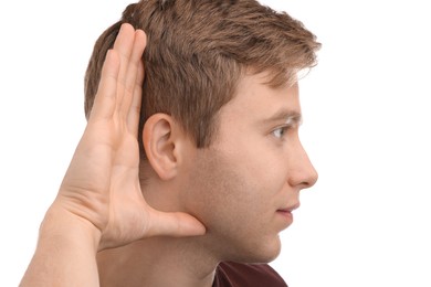 Photo of Sound. Man showing hand to ear gesture on white background