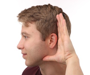 Photo of Sound. Man showing hand to ear gesture on white background