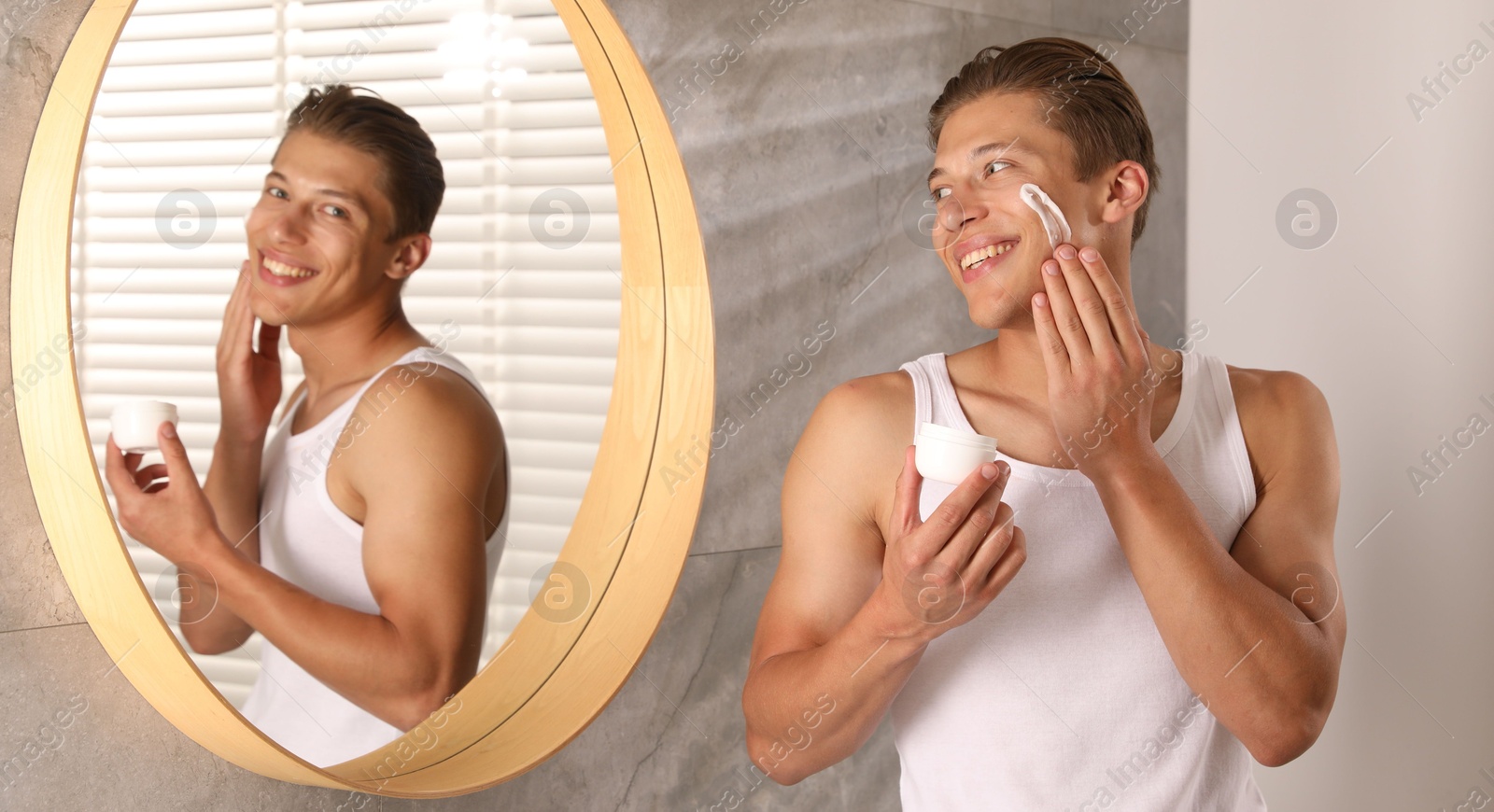 Photo of Handsome young man applying cream onto his face near mirror in bathroom