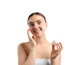 Photo of Beautiful woman applying cream onto her face on white background