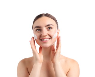 Photo of Beautiful woman with cream on her face against white background