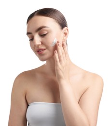 Photo of Beautiful woman with cream on her face against white background