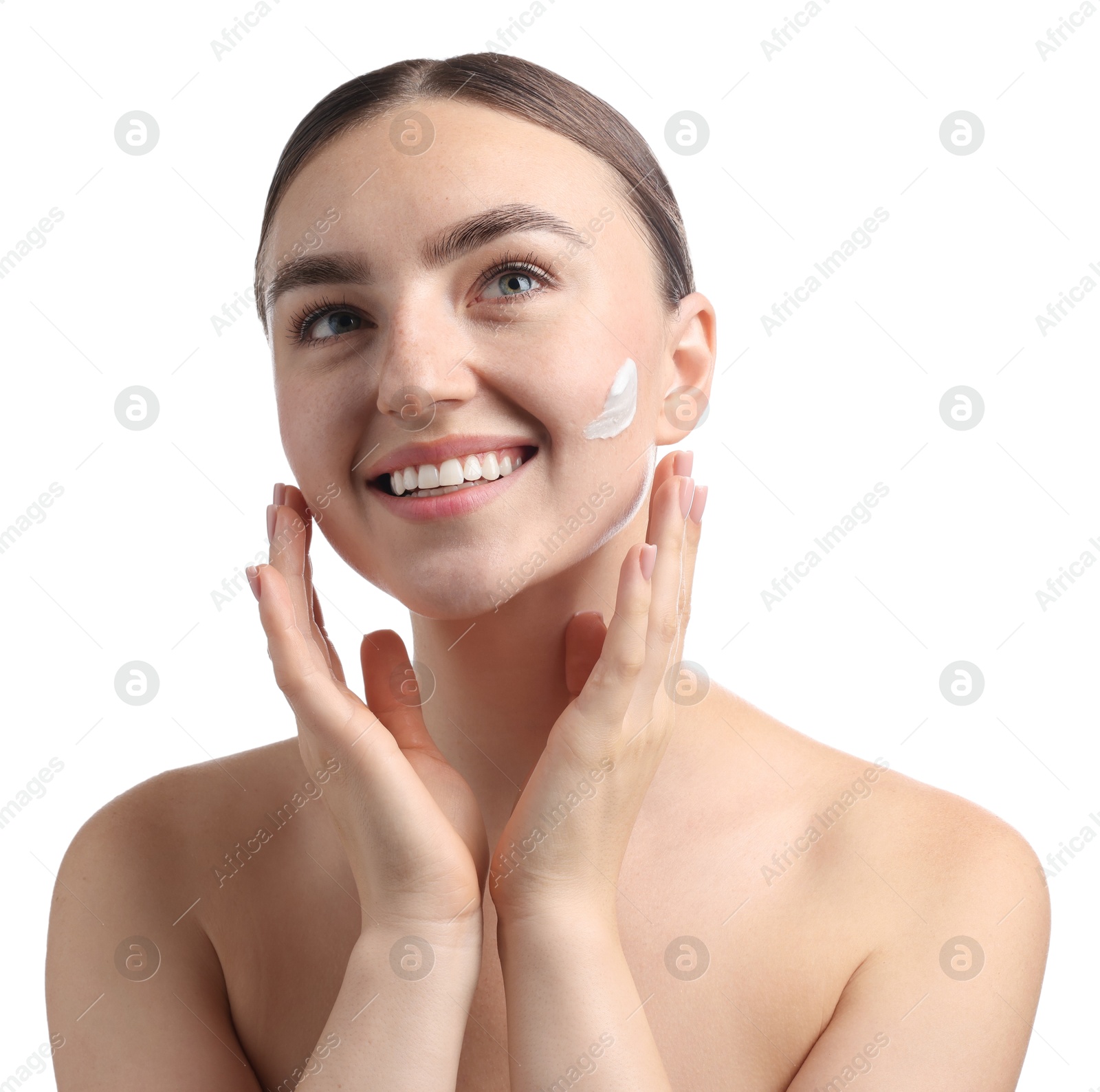 Photo of Beautiful woman with cream on her face against white background