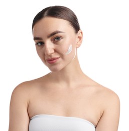 Photo of Beautiful woman with cream on her face against white background