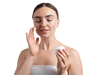 Photo of Beautiful woman with jar of face cream on white background