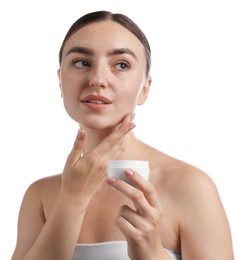 Photo of Beautiful woman applying cream onto her face on white background