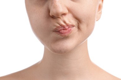 Photo of Woman rinsing mouth with mouthwash on white background, closeup. Oral hygiene